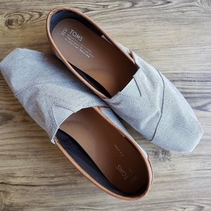 Men's grey and brown slip-ons.